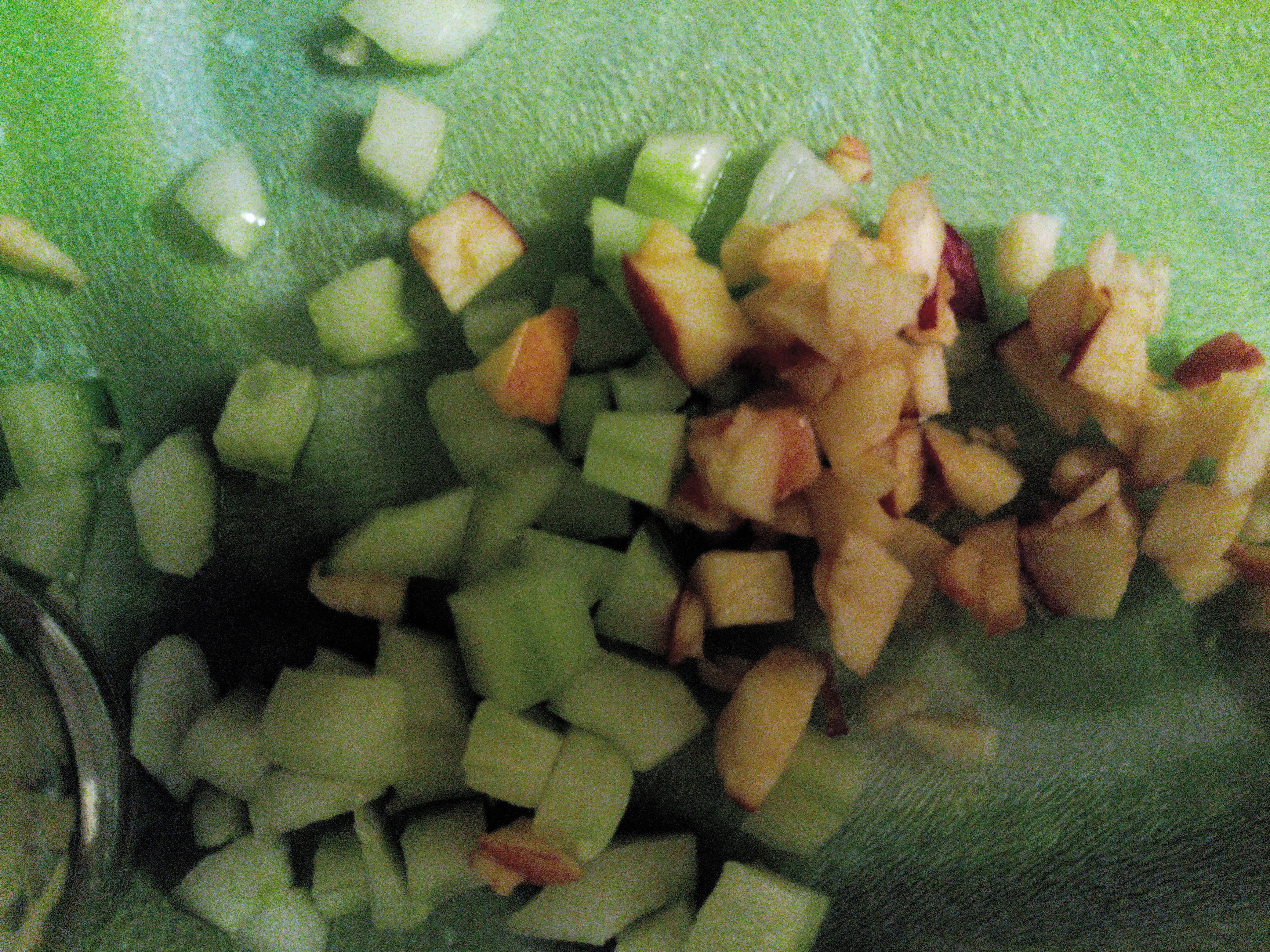 Tiny even cubes of apple and cucumber cut in a brunoise